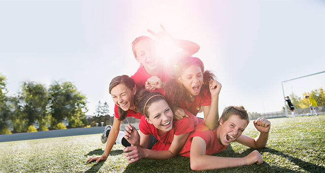 Sportförderung - Kinder beim Mannschaftssport