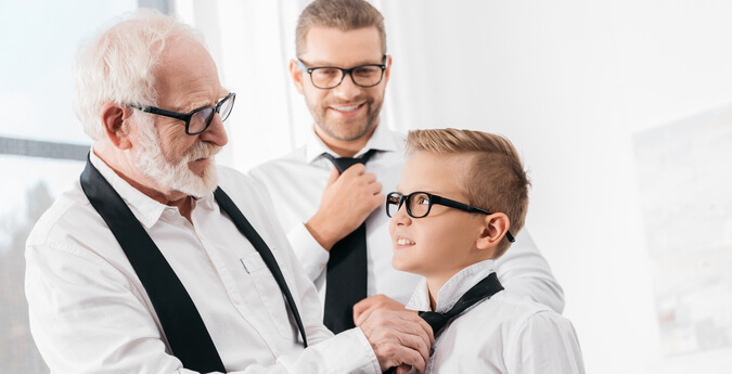 GenerationenPlan Invest - Männer binden Krawatten